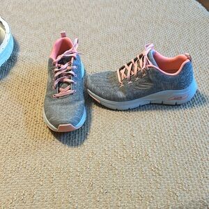 Skechers Arch fit sneakers.